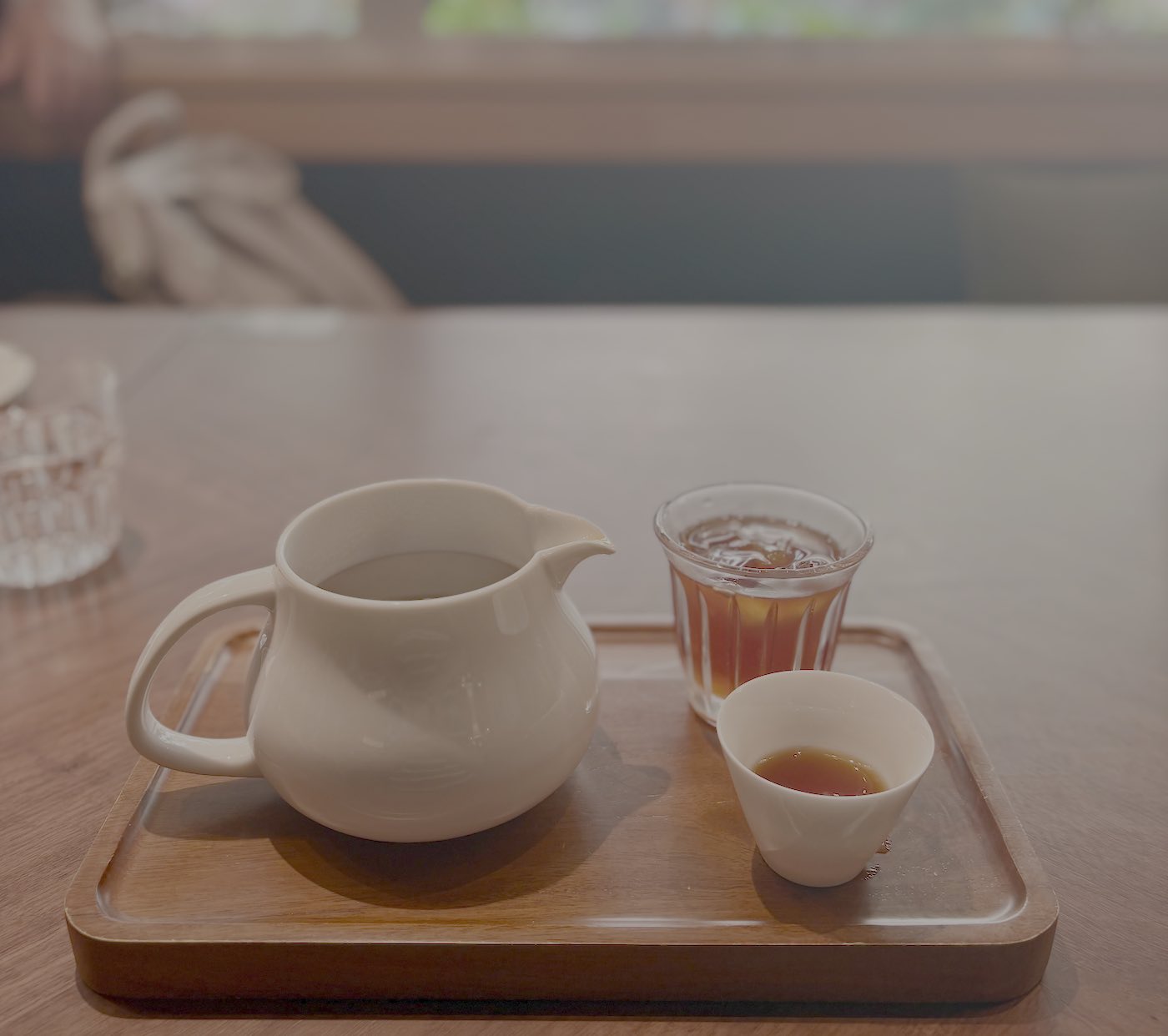 A pour-over set and a small cup — the first sip of Yunnan coffee.